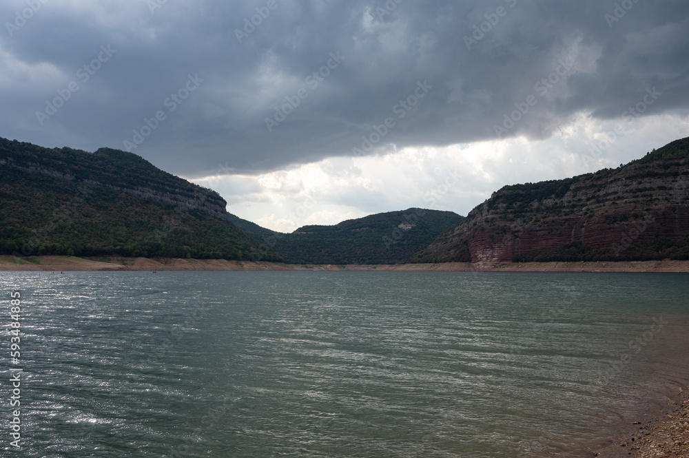 Landscape photography of the Sau reservoir in Barcelona, ​​it is a cloudy day and it is full of water, it is about to rain