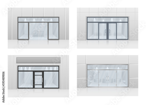 Set of modern entrance doors black. Store facade with storefront and exhibition lights. With tinted transparent glass. photo