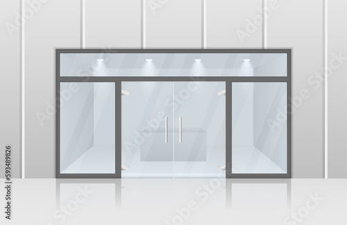 Shopping center mall entrance automatic doors with reflection and black frame. Glass entrance door. 