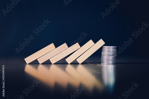Wooden blocks and coins failed in background business idea for text