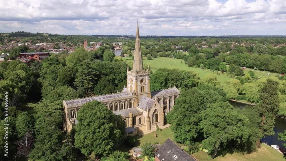 Establishing low aerial view from Holy Trinity church to reveal Stratford Upon Avon countryside English town landscape Establishing low aerial view from Holy Trinity church to reveal Stratford Upon Avon countryside English town landscape