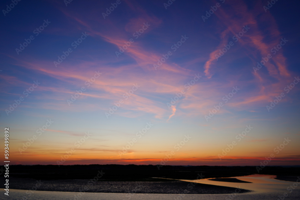 Dusk view over of the sky over a beach in the south of England Dusk view over of the sky over a beach in the south of England