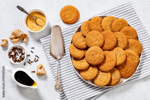 sweet soft ginger cookies on plate, top view photo