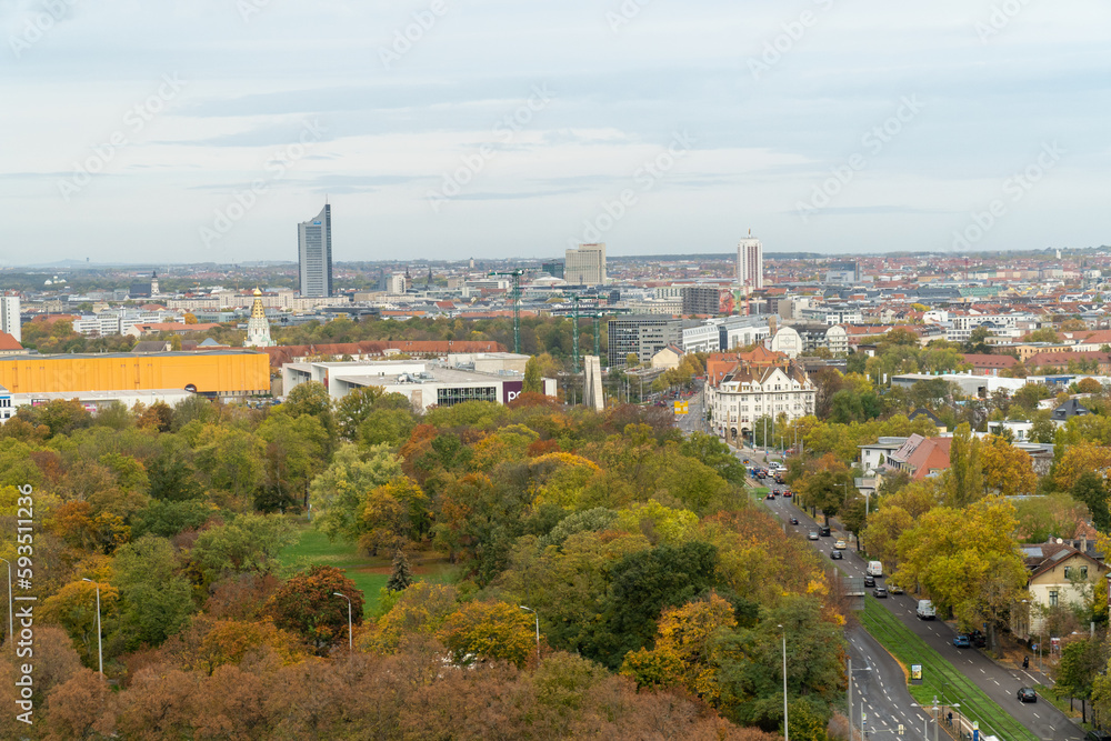 High angle view of Leipzig city in Germany. Panorama of the greenery during autumn season.