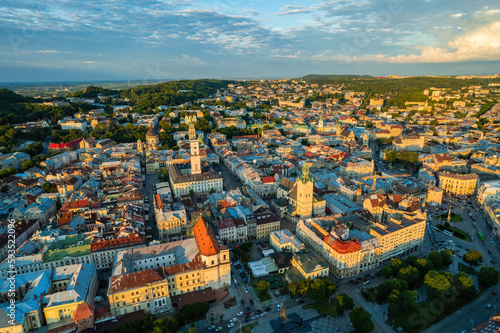 Rooftops of the old town in Lviv in Ukraine. The magical atmosphere of the European city. Landmark  the city hall and the main square. Drone photo.