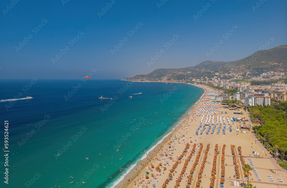 Drone photo of Alanya coast with Mediterranean turquoise sea and mountains