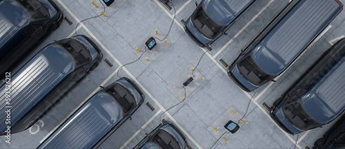 Fotografie, Obraz Overhead shot of electric EV delivery vans are being charged in company parking