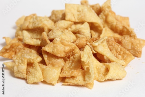Pile of Crispy Fried Wontons From Chinese Restaurant Isolated on White background