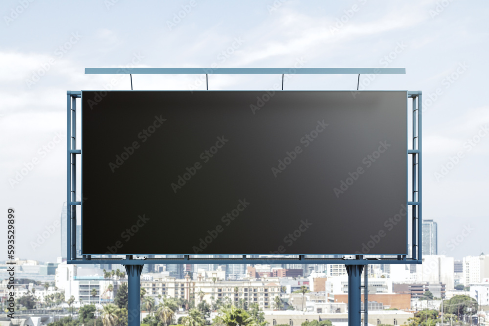 Blank black horizontal billboard on skyline background, front view. Mock up, advertising concept Blank black horizontal billboard on skyline background, front view. Mock up, advertising concept