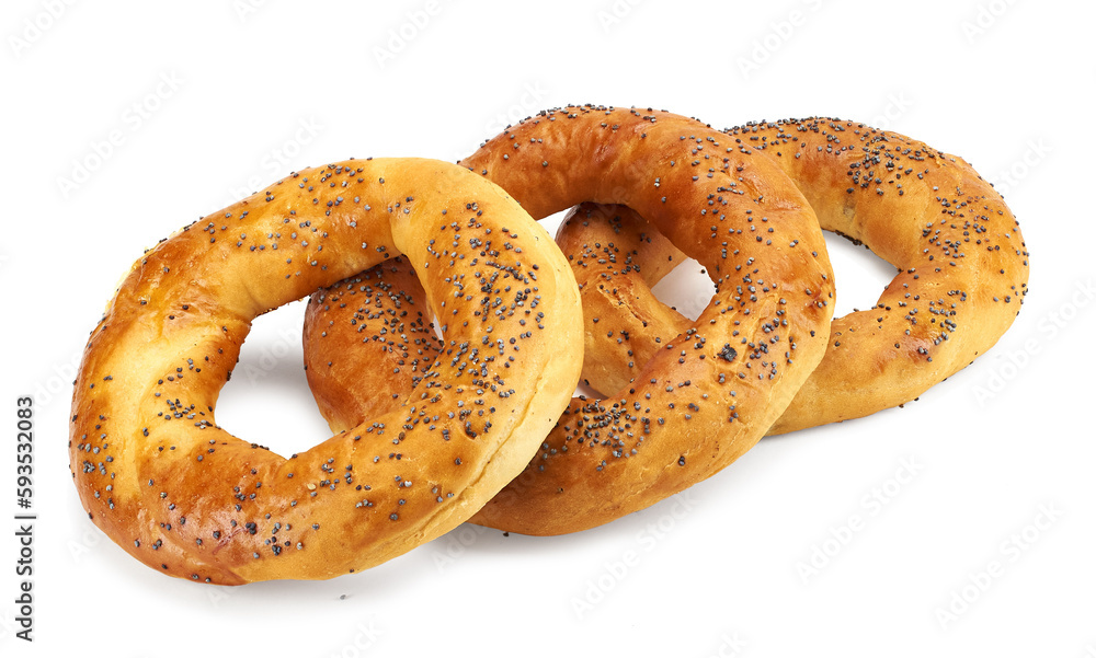 Fresh breakfast bread bagel roll with seeds isolated on white background Fresh breakfast bread bagel roll with seeds isolated on white background