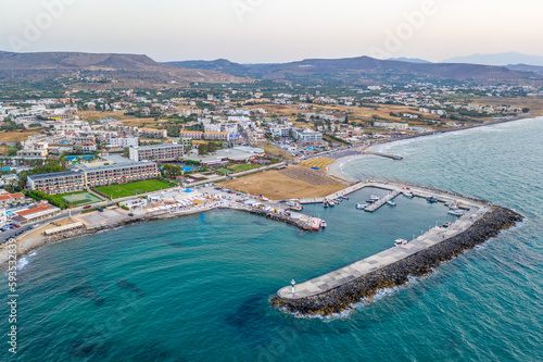 Marina Port Gouves - late afternno drone aerial photo, city landscape, buildings and blue water anb sandy beach © Łukasz Tyczkowski