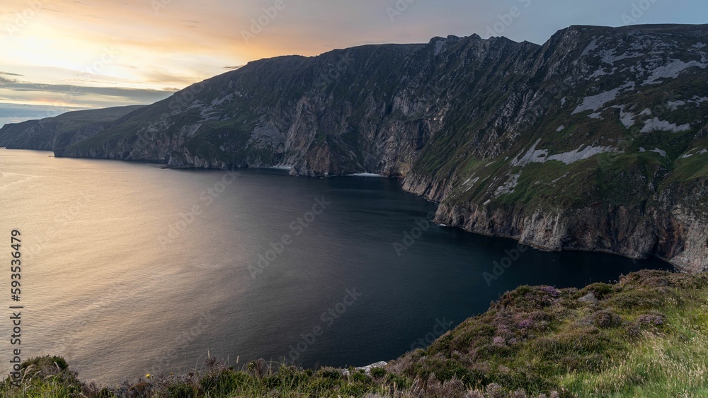 Drone sunset over a sea shore near the Slieve league cliffs in Ireland, cool for background