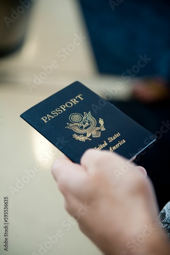 Traveler with USA passport in hand