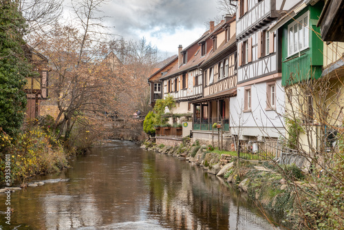 Kaysersberg; Alsace, France - December 7, 2022: Medieval houses by the river