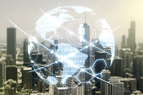 Virtual social network media hologram and world map on Chicago cityscape background. Double exposure