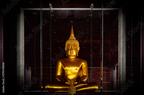 Chainat, April 17 2023.  Wat Klai Kangwon (Wat Khao Sarapatdee Sri Charoentham), An ancient temple dating back to the Lop Buriera(9th-12th century). 
 Golden buddha statue photo