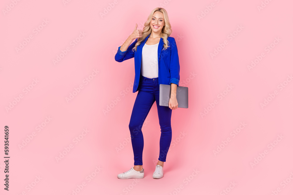 Photo of pretty business lady hold modern technology netbook thumb finger up smart casual outfit isolated pink color background Photo of pretty business lady hold modern technology netbook thumb finger up smart casual outfit isolated pink color background
