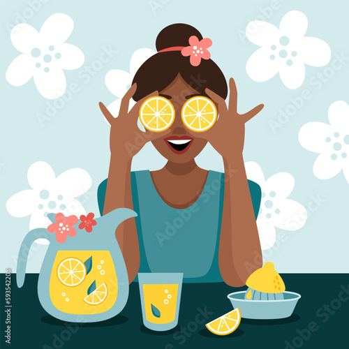 Woman prepares lemonade. Happy girl with lemons. Healthy food and life.