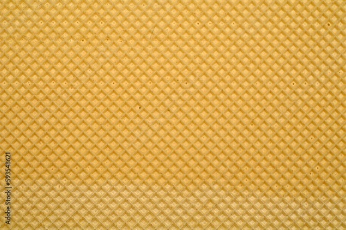 Closeup shot of the texture of a freshly-baked waffle