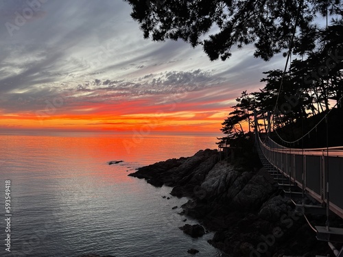 Sunset over the bridge.Mallipo beach Taean gun city South Korea.21.08.2022. photo