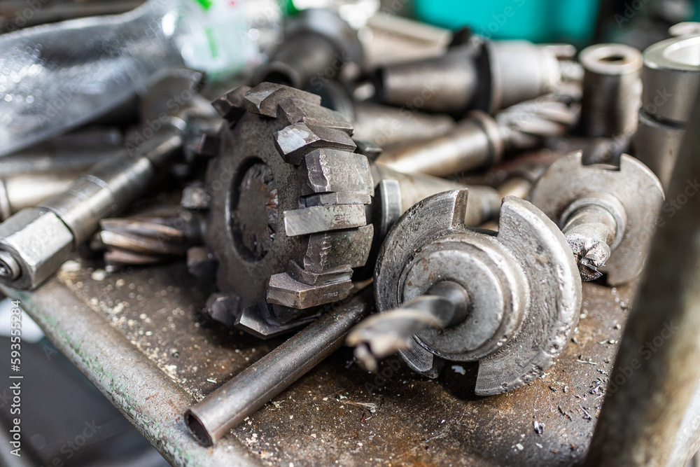 Old equipment, machines, tools in a rustic style in an abandoned mechanical factory Old equipment, machines, tools in a rustic style in an abandoned mechanical factory