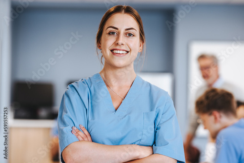 Young caucasian woman studying medicine at university photo