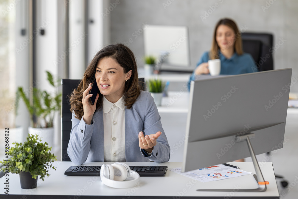 Shot of young entrepreneur woman working with laptop in the office Shot of young entrepreneur woman working with laptop in the office