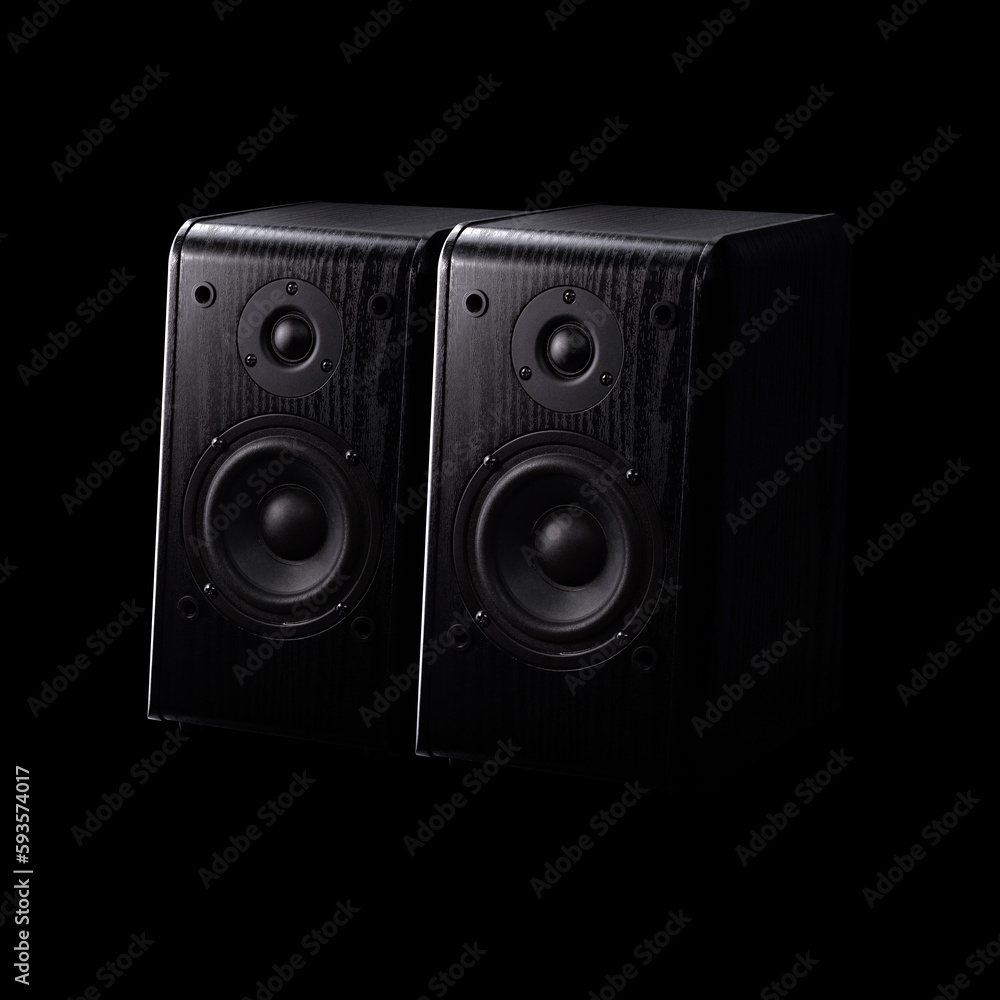 Two sleek, black audio monitors against a black background. Attractive and modern design, music and tech enthusiasts alike, sophisticated and stylish appearance. Audio equipment studio, stereo sound. Two sleek, black audio monitors against a black background. Attractive and modern design, music and tech enthusiasts alike, sophisticated and stylish appearance. Audio equipment studio, stereo sound.