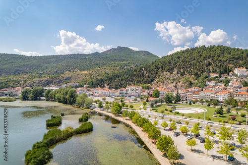 Wallpaper Mural Aerial view of traditional village with rural houses, white buildings with orange roofs in the middle of lake. Greece. Drone, copter view Torontodigital.ca
