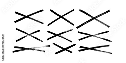 Brush drawn strikethrough vector elements collection. Crossed scribble lines drawn with marker isolated on white background. Handdrawn grunge vector underlines or strikethrough. X sign in sketch.