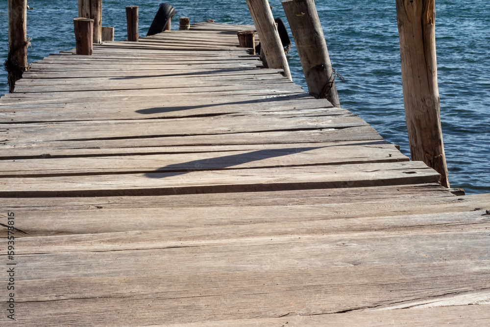 Fototapeta premium Wooden pontoon on the shore of Lake Titicaca, Copacabana, Bolivia.