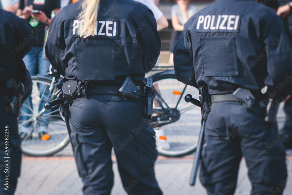German police squad formation in protective gear with German police squad formation in protective gear with