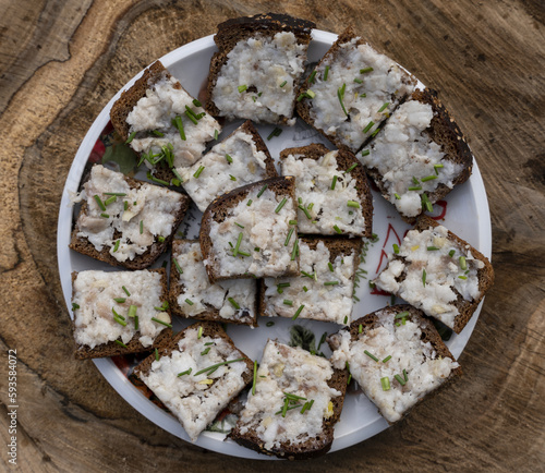 grated lard with garlic on black rye bread with finely chopped dill.