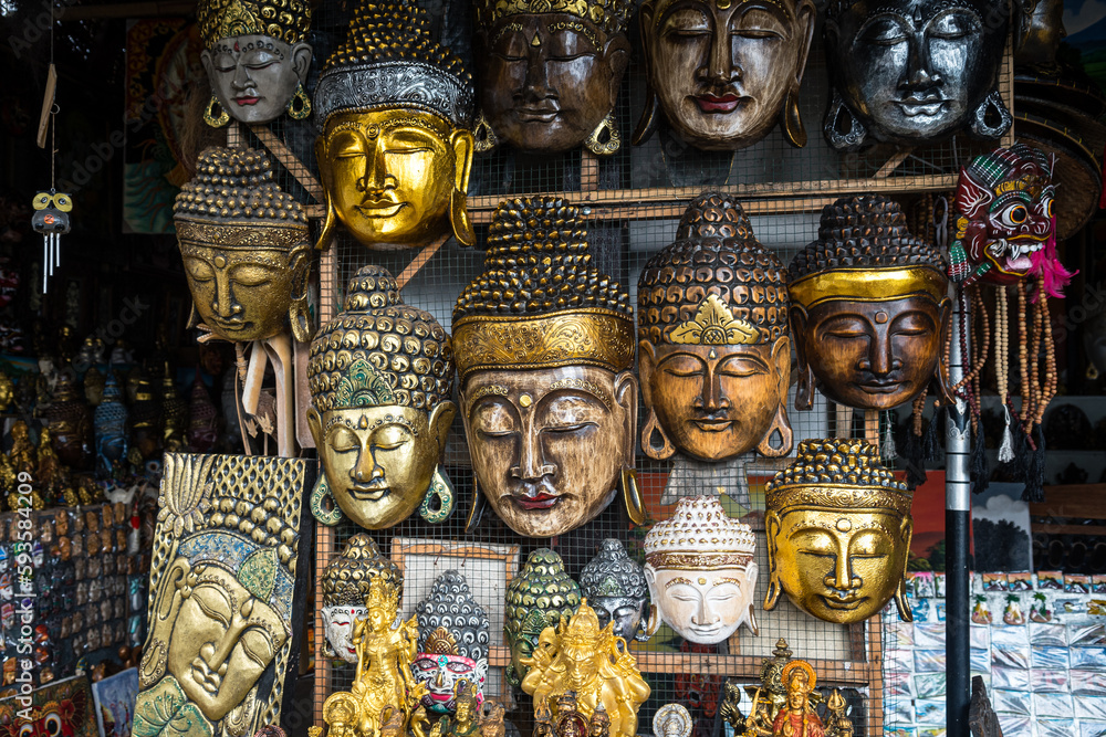 buddha heads on sale at balinese shop. indonesia