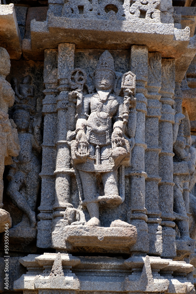 2 April 2023, Sculptures carved on the outer wall of the Laxminarayana temple one of the five rock temples inside Dharmaveergad / Bahadurgad, Pedgaon, Taluka Shrigonda, Maharashtra, India