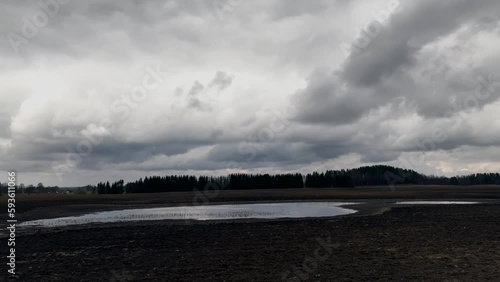 Tloudy sky plowed field landscape spring season