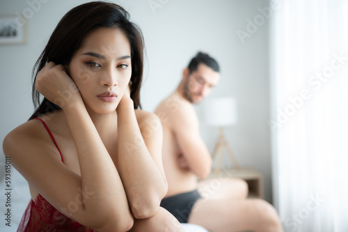 Couple in bed unhappy in sex It's a relationship problem in a married life. The concept of erectile dysfunction, causes of divorce