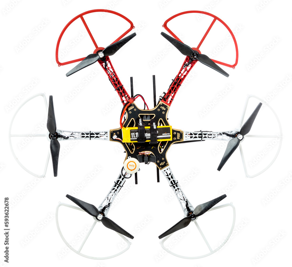 FORT COLLINS, CO, USA, January 14, 2015: Radio controlled DJI F550 Flame  Wheel hexacopter drone with carbon fiber propellers and LiPo battery. top  view isolated on white. Stock Photo | Adobe Stock