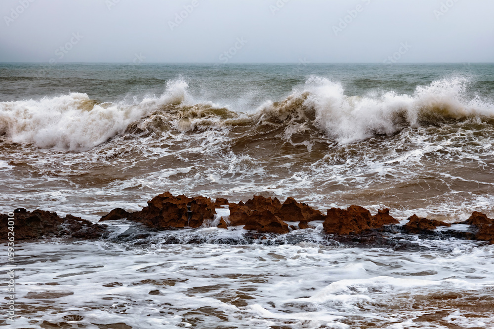 Fototapeta premium View of the stormy Atlantic Ocean coast in the area of Essaouira in Morocco.