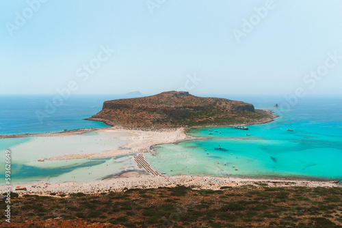 Panoramic view of Balos Beach Lagoon and Gramvousa Island with turquoise Mediterranean waters on the northwestern coast of Crete, Greece