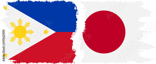 Japan and Philippines grunge flags connection vector
