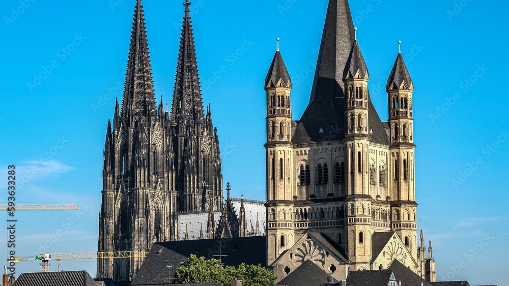 Fototapeta premium Cologne Cathedral in Germany against a blue sky