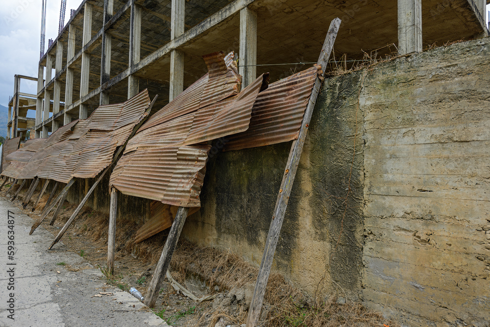 tin rusty roof panels leaning on rural building in construction tin rusty roof panels leaning on rural building in construction