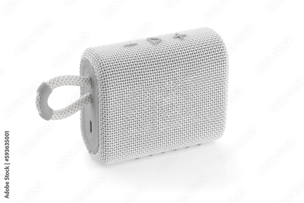 Wireless speaker on a white background. Round music speaker close-up. Wireless speaker on a white background. Round music speaker close-up.