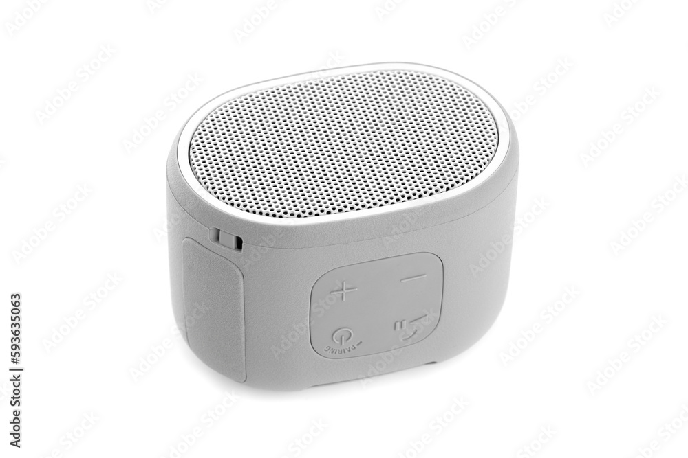 Wireless speaker on a white background. Round music speaker close-up. Wireless speaker on a white background. Round music speaker close-up.
