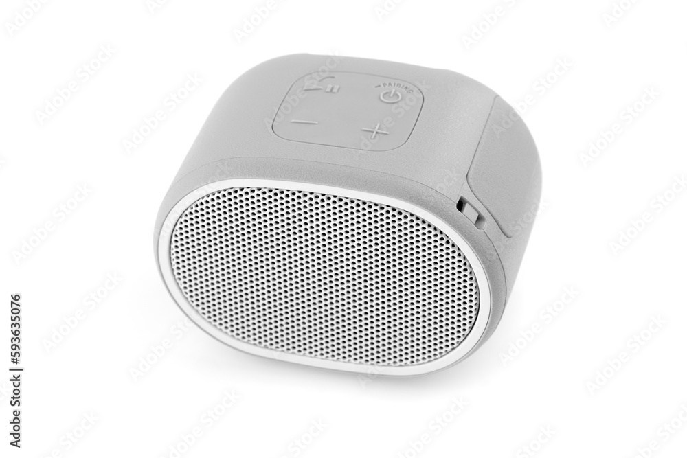 Wireless speaker on a white background. Round music speaker close-up. Wireless speaker on a white background. Round music speaker close-up.