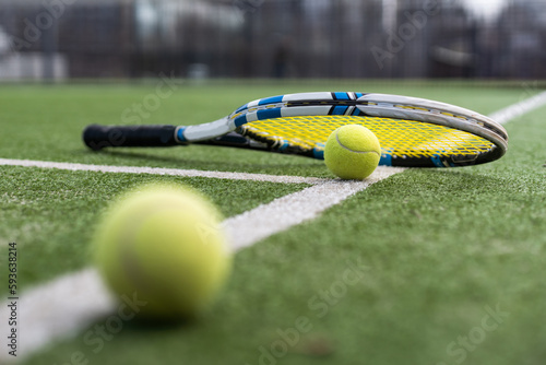 tennis ball on tennis grass court