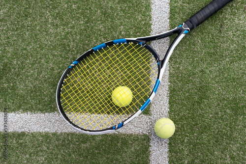 tennis ball on tennis grass court © Angelov