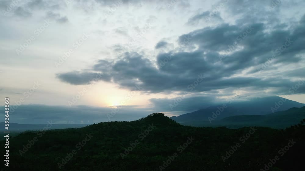 Dawn in the clouds and a flying bird Dawn in the clouds and a flying bird