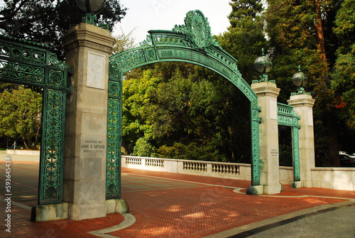 The historic Sather Gates marks the entrance to the campus of the University of California Berkeley on Sproul Plaza photo